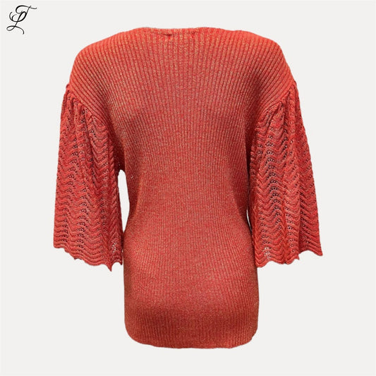 Chastar Viscose Topje in koraal met ajourmouwen en lichte glitter, elegant en comfortabel, one size S t/m L.