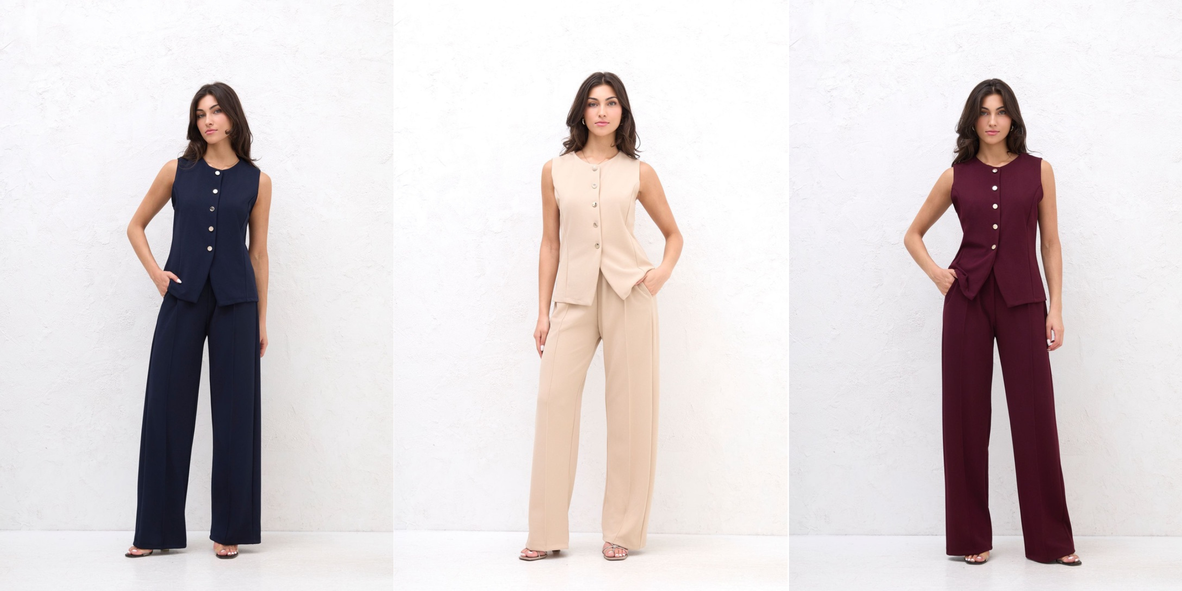 Drie vrouwen poseren in effen, mouwloze top en wijde broek in blauw, beige en donkerrood voor een witte achtergrond.