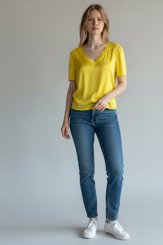 Trendy Leslie yellow silk-viscose V-neck top with crochet shoulder details and short sleeves.